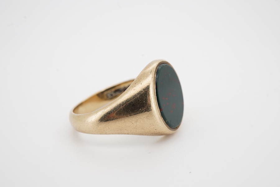 A 9ct gold and bloodstone signet ring, size P1/2, British hallmarks, gross weight 6 grams, Condition: fair, some light wear, shank misshapen